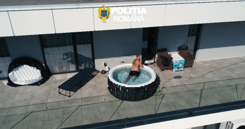 video momentul in care un roman urmarit international este saltat de politisti dintr o piscina gonflabila de pe terasa apartamentului sau 6a3faad2a7c95